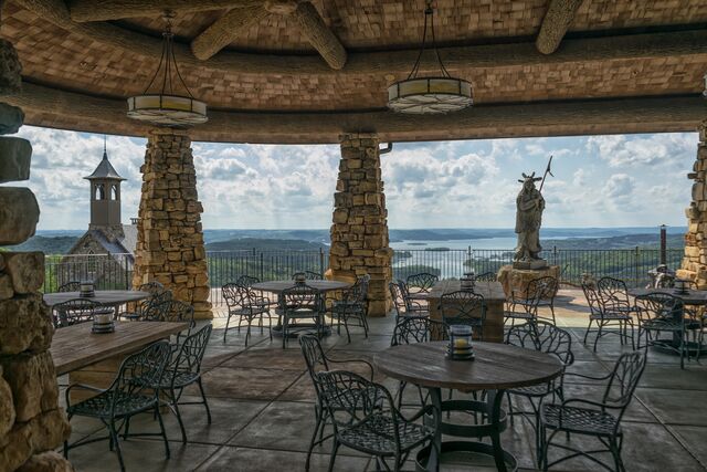 Seating on the covered patio at Buffalo Bar at Big Cedar Lodge offers expansive views of Table Rock Lake.
